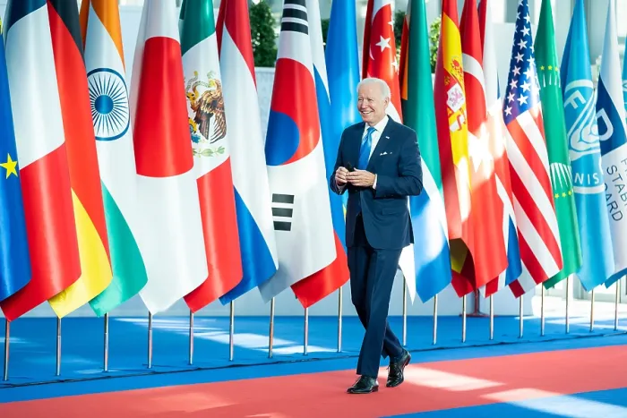 Framed Print : President Joe Biden walks past the flags of the G20 member nations as he arrives at La Nuvola Convention Center in Rome for the G20 summit, Oct. 30, 2021 (BSLOC_2021_15_20)