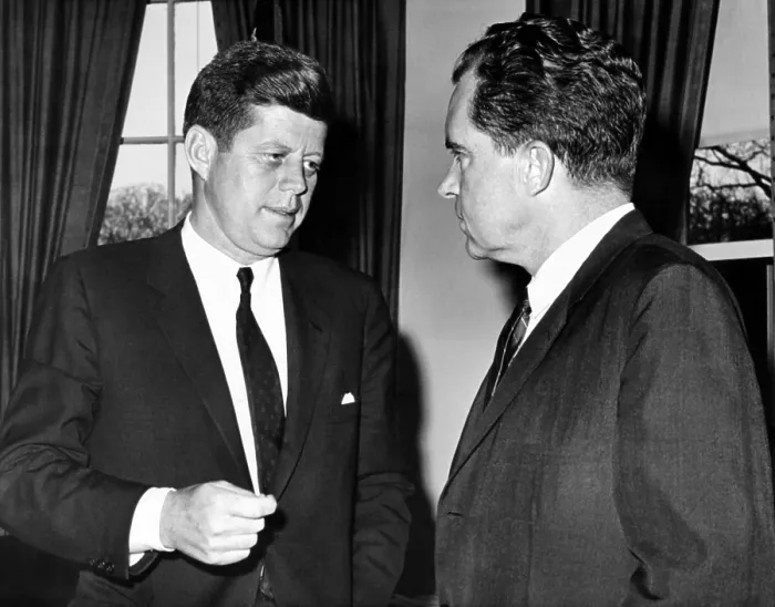 Framed Print : President John Kennedy confers with former Vice President Richard Nixon. They had a 75 minute meeting to discuss the Cuban Crisis caused by the failed Bay of Pigs invasion