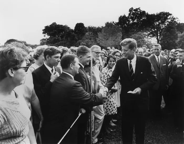 Framed Print : President John Kennedy meets with one of the first groups of Peace Corps volunteers. White House lawn, Aug. 11, 1961