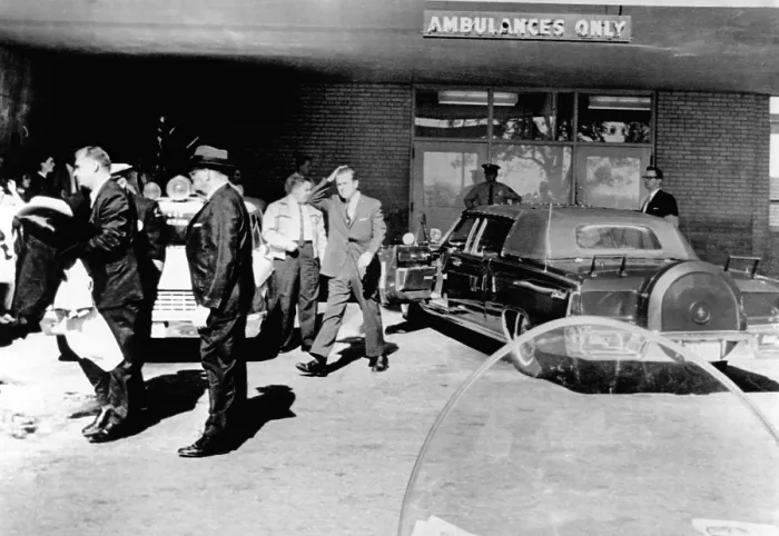 Framed Print : President John Kennedy's limousine at Parkland Hospital. Secret Serviceman quickly covered the open convertible in which Kennedy and Governor Connally were shot Framed Print : President John Kennedy's limousine at Parkland Hospital. Secret Serviceman quickly covered the open convertible in which Kennedy and Governor Connally were shot