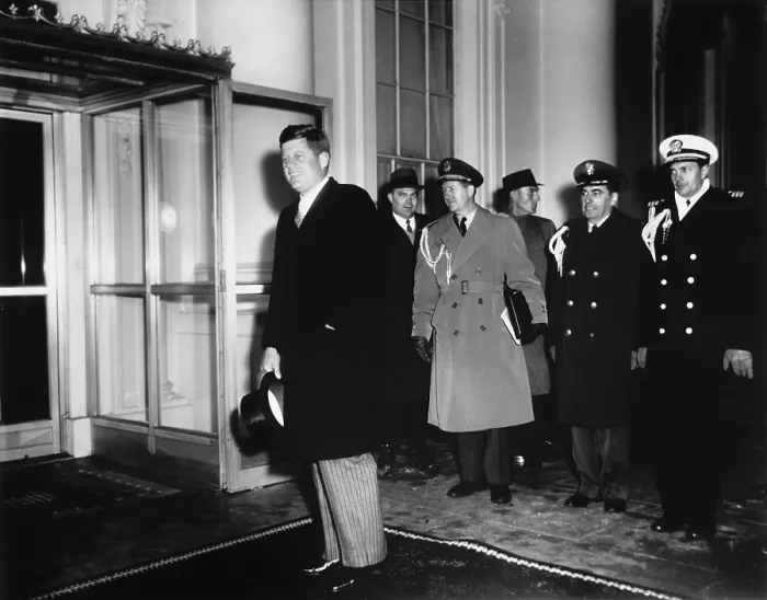 Framed Print : President Kennedy, accompanied by uniformed senior military officers, returns to the White House after attending Inaugural Balls. January 21, 1961