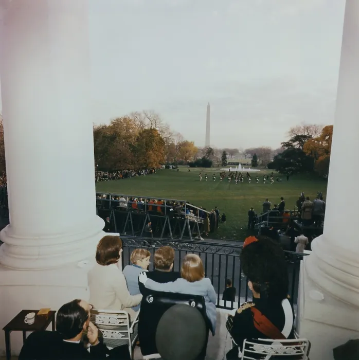 Framed Print : President Kennedy and his family watch the Black Watch Tattoo perform from the South Balcony of the White House