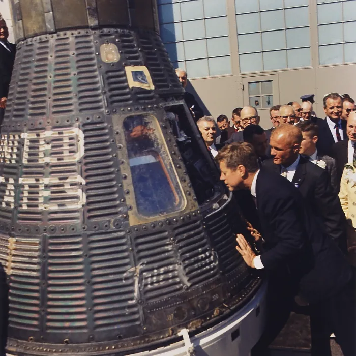 Framed Print : President Kennedy inspects interior of Friendship 7, the Project Mercury space capsule manned by John Glenn, the first American to orbit the Earth in space. May 8, 1961