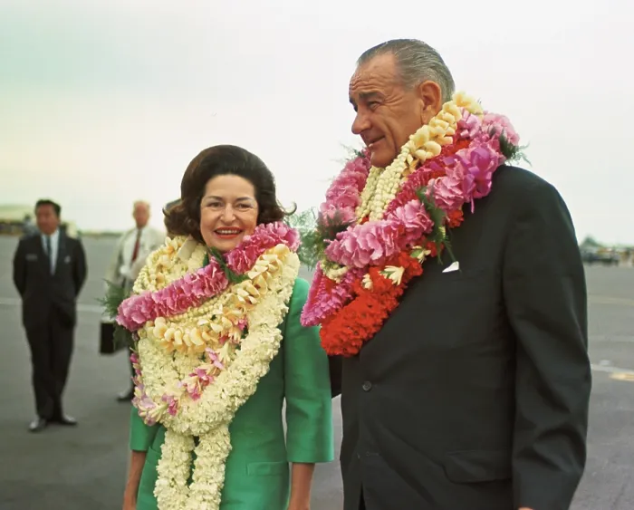 Framed Print : President and Lady Bird Johnson wearing leis in Hawaii. They were on a stop-over before continuing on the Presidents Asian trip. Oct. 18, 1966