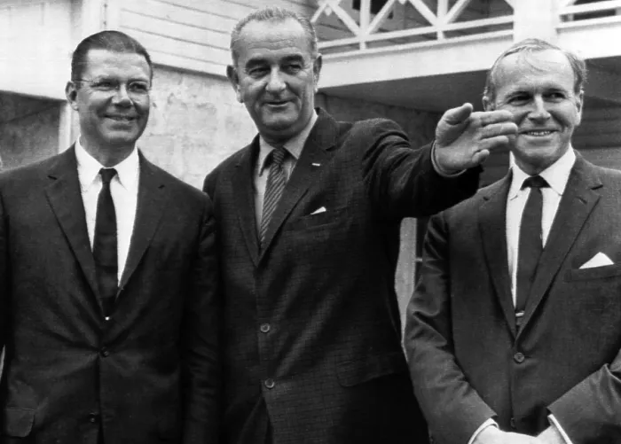 Framed Print : President Lyndon B. Johnson gestures as he talks to Defense Secretary Robert McNamara (l) and Deputy Secretary of Defense Roswell Gilpatric (r) during a meeting at the LBJ Ranch
