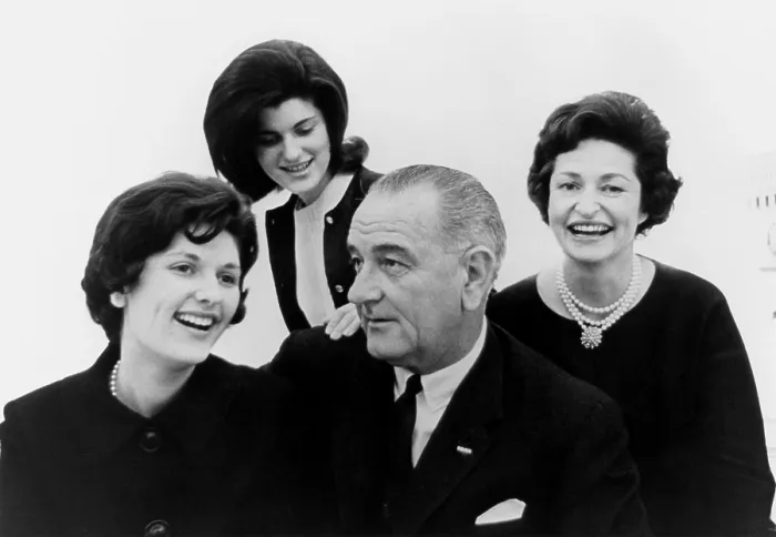 Framed Print : President Lyndon Johnson family portrait. Lynda Johnson, Luci Johnson, Pres. Lyndon Johnson, Lady Bird smiling but still dressed in black a week after the Kennedy Assassination Framed Print : President Lyndon Johnson family portrait. Lynda Johnson, Luci Johnson, Pres. Lyndon Johnson, Lady Bird smiling but still dressed in black a week after the Kennedy Assassination