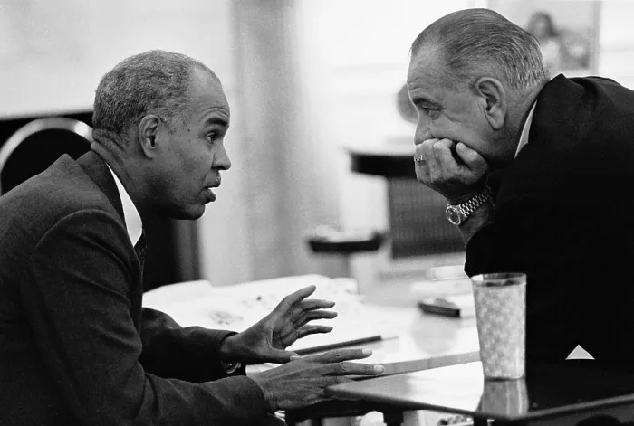 Framed Print : President Lyndon Johnson listening to NAACP leader Roy Wilkins in Oval Office. August 3, 1965