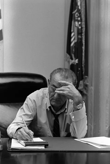 Framed Print : President Lyndon Johnson making notes in Cabinet Room meeting. Four days later, on March 31, 1968, he withdrew from the 1968 presidential contest