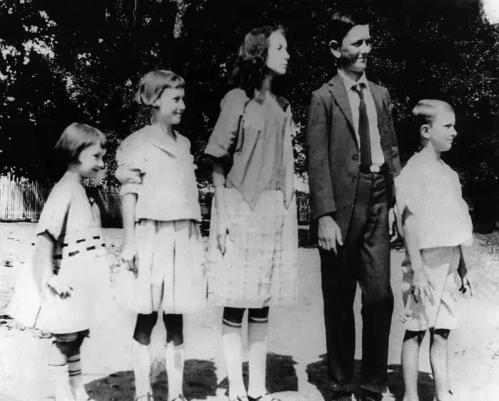 Framed Print : President Lyndon Johnson in an old family photo with his siblings. L-R: Lucia, Joseph, Rebekah, Lyndon in his first long pants, and Sam. Stonewall. Texas. 1921