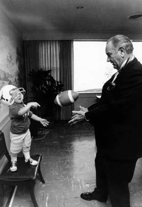Framed Print : Former President Lyndon Johnson plays with his grandson, Lyn Nugent. Lyn is wearing a helmet as they toss a football. May 19, 1971. (CSU_ALPHA_719) CSU Archives / Everett Collection Framed Print : Former President Lyndon Johnson plays with his grandson, Lyn Nugent. Lyn is wearing a helmet as they toss a football. May 19, 1971. (CSU_ALPHA_719) CSU Archives / Everett Collection
