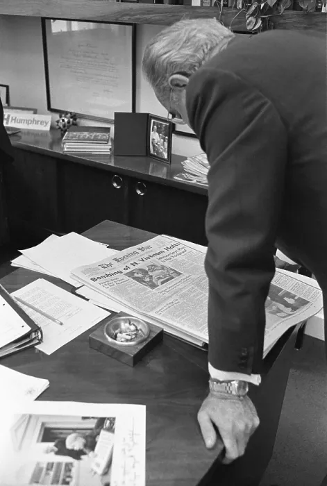 Framed Print : President Lyndon Johnson reading newspaper reporting his concession to North Vietnam's demand to halt all bombing within their borders Framed Print : President Lyndon Johnson reading newspaper reporting his concession to North Vietnam's demand to halt all bombing within their borders