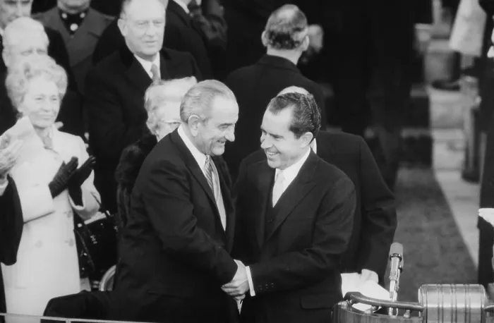 Framed Print : President Lyndon Johnson warmly shakes hands with President-elect Richard Nixon at the Jan. 20 1969 inauguration ceremony