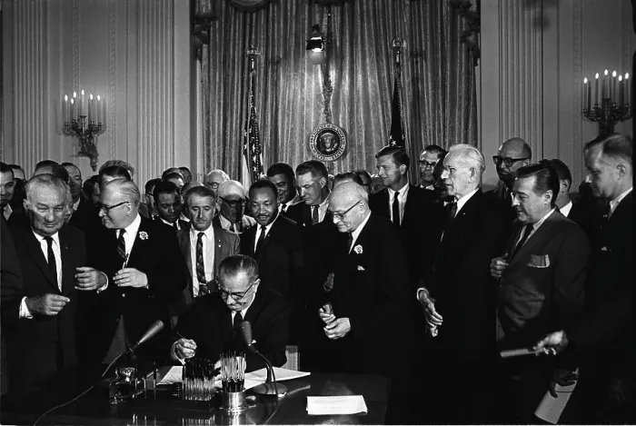 Framed Print : President Lyndon Johnson, watched by Martin Luther King, Jr. signing the Civil Rights Act, July 2, 1964