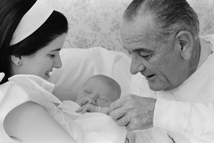 Framed Print : President Lyndon Johnson's first grandchild. Sleeping in his mother Luci's arms, Patrick Lyndon Nugent was born on June 21, 1967 at Seton Hospital, in Austin, Texas