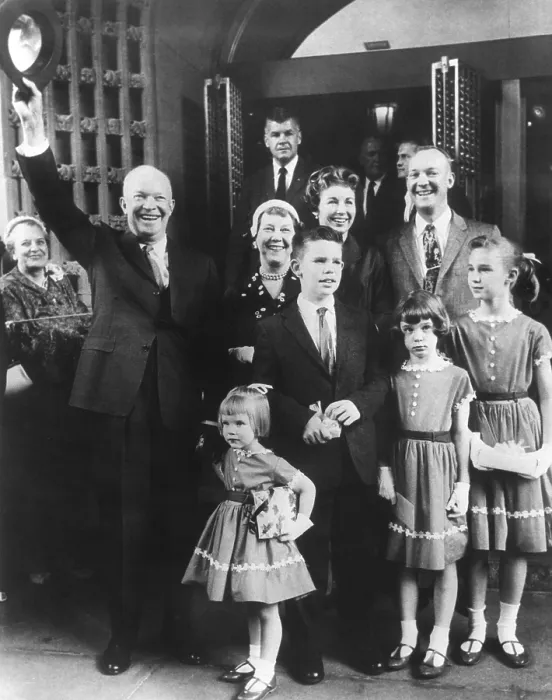 Framed Print : President and Mamie Eisenhower with their son John, his wife Barbara and four children leaving church. Ca. 1958