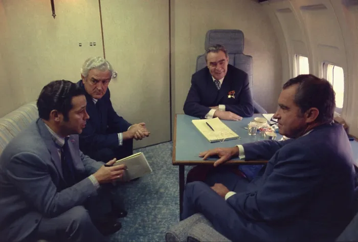 Framed Print : President Nixon Soviet leader Brezhnev talk with John Connally on the Spirit of 76 Air Force One while en route to San Clemente California. June 22 1973