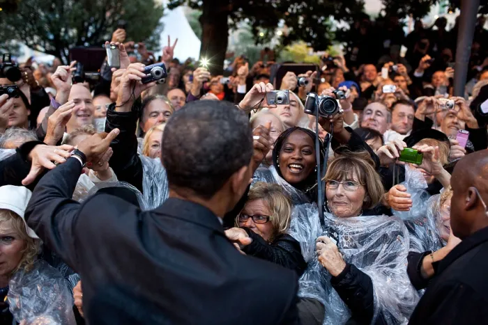 Framed Print : President Obama greets people following a ceremony to honor the French and American Alliance. The French waited in the rain at the World War I Memorial in Cannes, France, Nov Framed Print : President Obama greets people following a ceremony to honor the French and American Alliance. The French waited in the rain at the World War I Memorial in Cannes, France, Nov