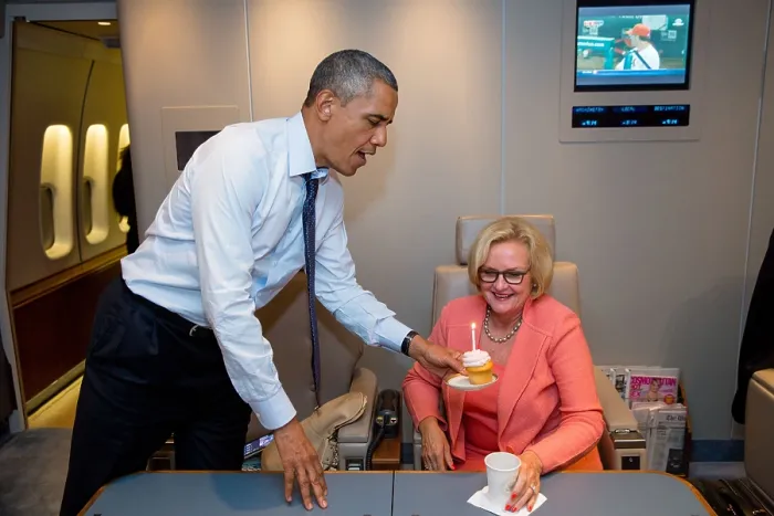 Framed Print : President Obama presents Sen. Claire McCaskill, with a birthday cupcake aboard Air Force One. July 24, 2013. (BSLOC_2015_13_230)