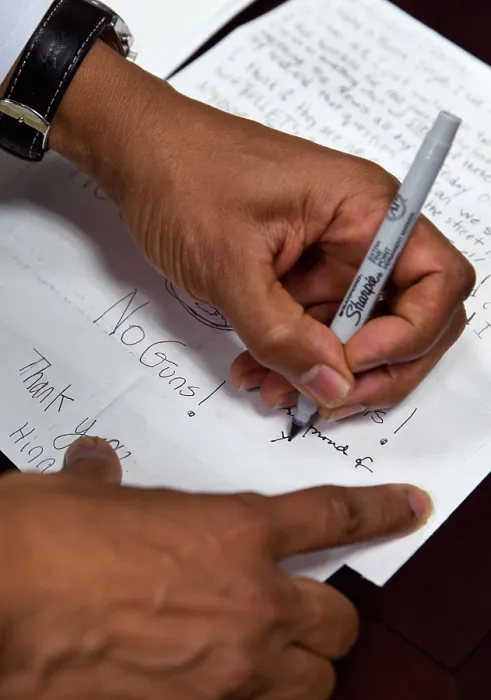 Framed Print : President Obama signs letters from children on their concerns about gun violence and school safety. Jan. 16, 2013