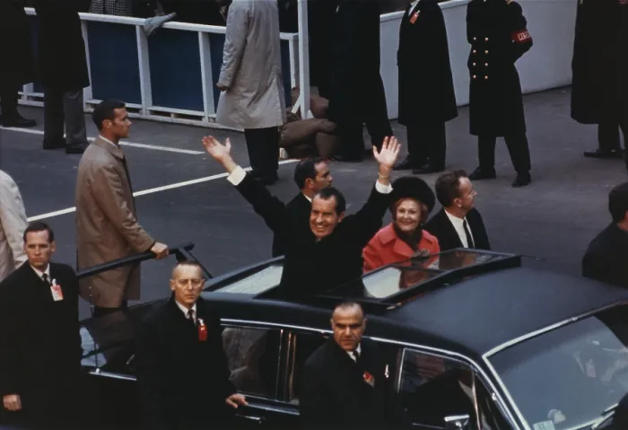 Framed Print : President and Pat Nixon waving to the crowd from the Presidential limousine in the Inaugural motorcade. Jan 20 1969