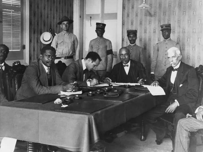 Framed Print : President Philippe Sudre Dartiguenave, seated, 2nd from left, with cabinet ministers, Nov. 1915. In the left background, stands his bodyguard, US Marine Sergeant H.E. Miller Framed Print : President Philippe Sudre Dartiguenave, seated, 2nd from left, with cabinet ministers, Nov. 1915. In the left background, stands his bodyguard, US Marine Sergeant H.E. Miller