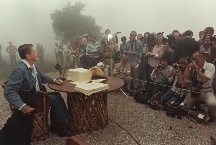 Framed Print : President Reagan meeting with the Press after signing the landmark Tax Reconciliation Bill at his California home Rancho Del Cielo Framed Print : President Reagan meeting with the Press after signing the landmark Tax Reconciliation Bill at his California home Rancho Del Cielo