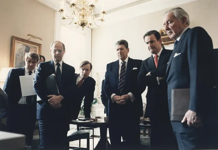 Framed Print : President Reagan and his staff watching a televised replay of the Space Shuttle CHALLENGER explosion