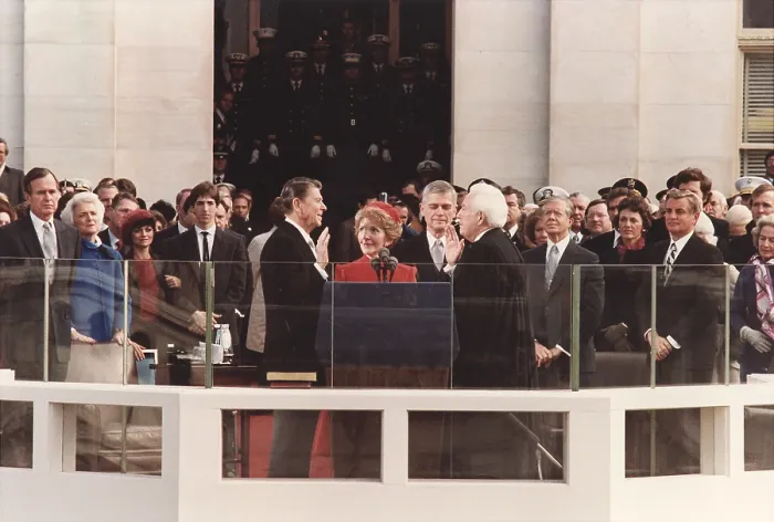 Framed Print : President Reagan being sworn in on Inaugural Day U.S. Capitol. Chief Justice Warren Berger leads the ceremony as Nancy Reagan holds the Bible