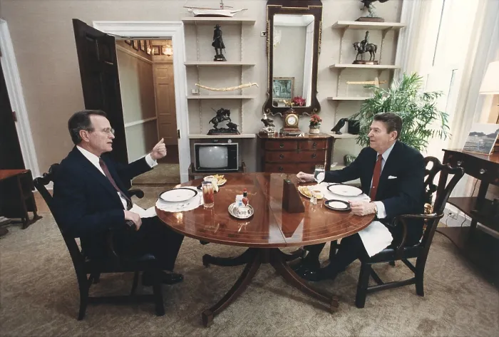 Framed Print : President Reagan and Vice-President Bush eating lunch in the Oval Office Study. Bush had established himself as the 1988 Republican nominees in the Super Tuesday primaries. Mar