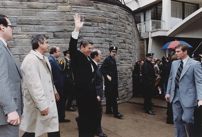 Framed Print : President Reagan waving to crowds immediately before being shot in an assassination attempt, Washington Hilton Hotel. March 30, 1981