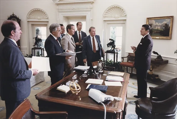 Framed Print : President Reagan and his White House staff discussing the assassination of Egyptian President Anwar Sadat. Oct. 6 1981. (BSLOC_2011_2_6)