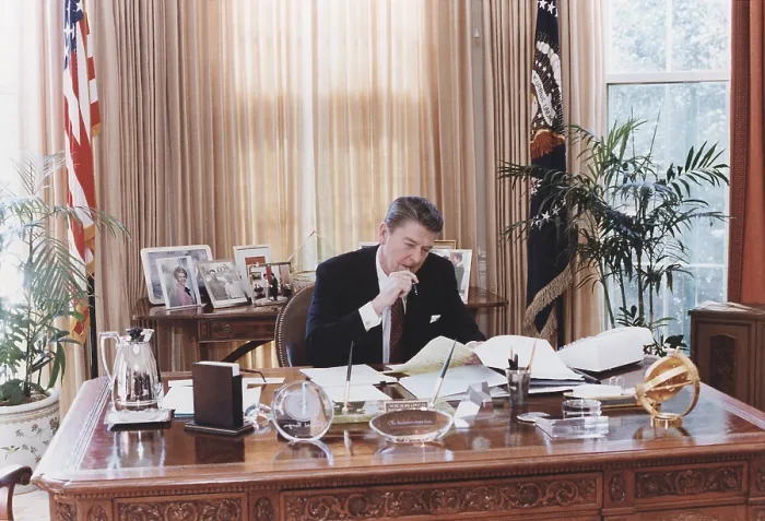 Framed Print : President Reagan working at his Oval Office desk shortly before delivering his 1982 State of the Union address to Congress. Jan 26 1982. PO-USP-Reagan_NA-12-0094M