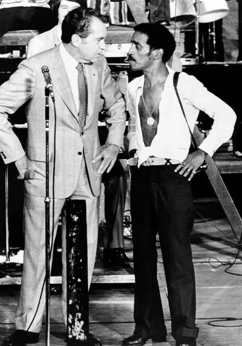 Framed Print : President Richard Nixon and comedian Sammy Davis, Jr. on stage at Miami's Marine Stadium. Davis, a long-time Democrat, switched his allegiance to Nixon. June 23, 1972