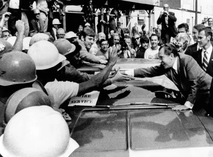 Framed Print : President Richard Nixon leans across car to shake hands with construction workers were from the new IBM building in Chicago. Sept 17, 1970