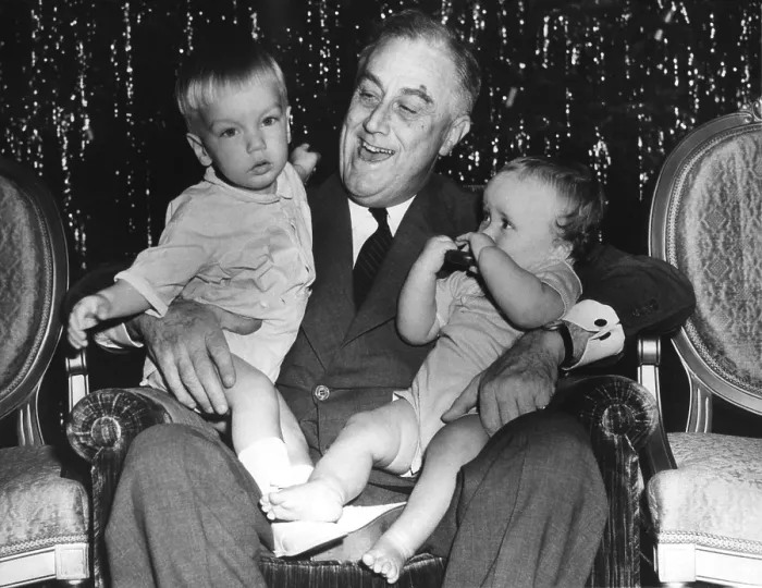 Framed Print : President Roosevelt celebrates Christmas with two of his grandsons. Dec. 24, 1939. At the White house he holds Franklin D. Roosevelt III (left) and John R. Boettiger (right)