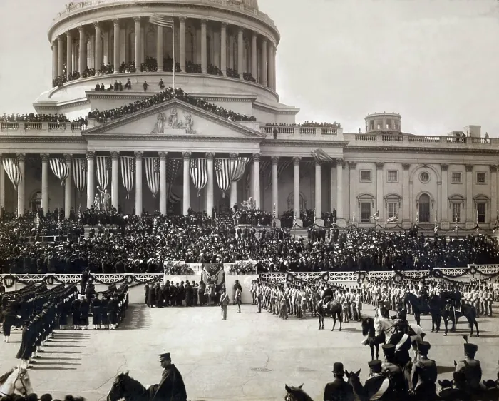 Framed Print : President Roosevelt taking the oath of office, Mar. 4 1905. The east portico of the U.S. Capitol is decorated with flags and masses of people crowd its roofs and balconies