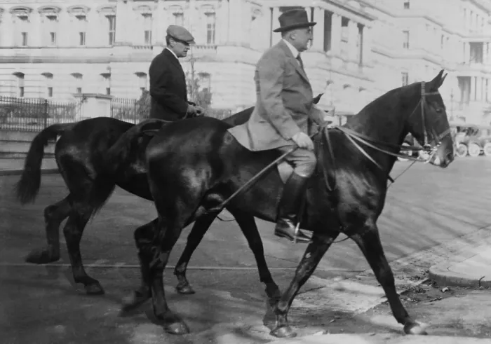 Framed Print : President Warren Harding and George Christian, Secretary to Harding, on horseback. They are riding on the National Mall
