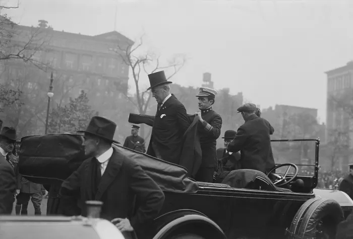 Framed Print : President Woodrow Wilson assisted by his personal physician, Admiral Cary Grayson, c. 1913-1919. From 1913 until his death in 1924 Framed Print : President Woodrow Wilson assisted by his personal physician, Admiral Cary Grayson, c. 1913-1919. From 1913 until his death in 1924