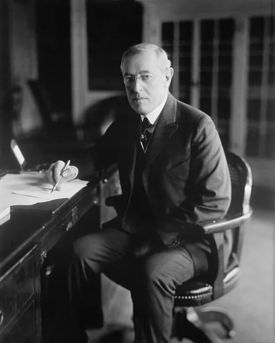 Framed Print : President Woodrow Wilson, seated at his desk in the Oval Office, White House, c. 1913-1916 (BSLOC_2016_11_11)