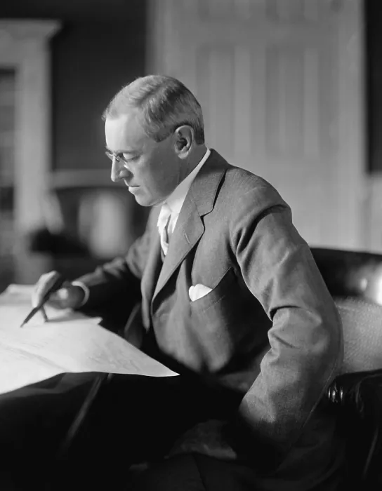 Framed Print : President Woodrow Wilson, seated at his desk in the Oval Office, White House, c. 1913-1916 (BSLOC_2016_11_10)