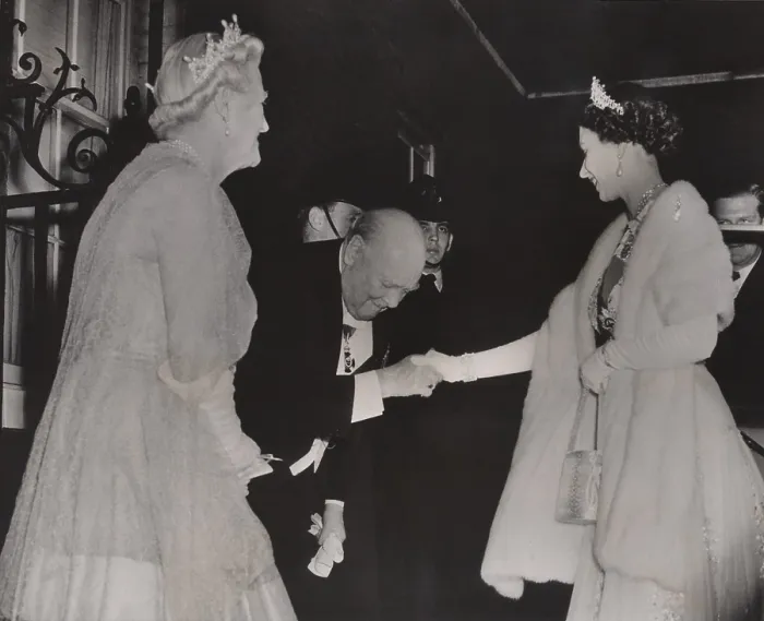 Framed Print : Prime Minister Winston Churchill and Lady Churchill bows to Queen Elizabeth as she arrives at his retirement dinner in London, April 4, 1955