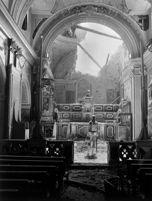 Framed Print : Private Paul Oglesby, stands before the altar of a damaged Catholic Church during World War 2