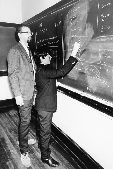 Framed Print : Professor Harry Dym, works with his 12 year old student, Matthew Marcus at New York City College. Sept. 16, 1968