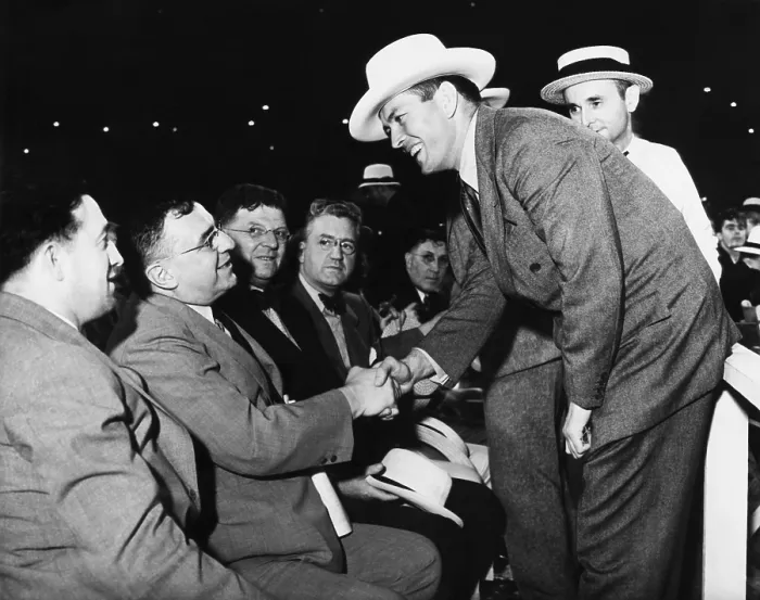 Framed Print : Two prominent citizens were at the ringside in the Cleveland Stadium. Gene Tunney, the retired undefeated heavyweight champion and Mayor Anton J. Cermak of Chicago shake hands