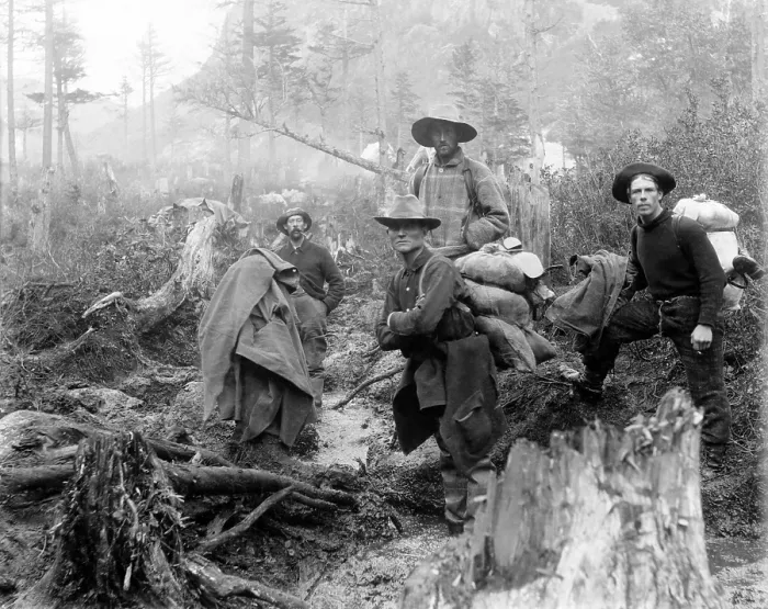 Framed Print : Four prospectors posed on trail in Alaska during the Yukon gold rush in 1897