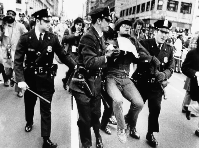 Framed Print : Protester arrested at President Richard Nixon's 1973 Inauguration. Police drag away an antiwar demonstrator from the Inaugural Parade. Jan 20, 1973 Framed Print : Protester arrested at President Richard Nixon's 1973 Inauguration. Police drag away an antiwar demonstrator from the Inaugural Parade. Jan 20, 1973