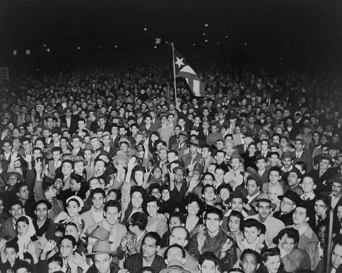 Framed Print : Puerto Rican crowd waits to hear former Secretary of State Henry Wallace speak in New York City. 1946 Framed Print : Puerto Rican crowd waits to hear former Secretary of State Henry Wallace speak in New York City. 1946