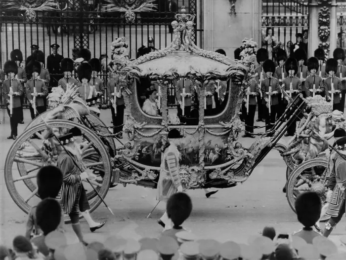 Framed Print : Queen Elizabeth II riding in the Gold State Coach enroute to her coronation. June 6, 1953. - (BSLOC_2014_15_259) Framed Print : Queen Elizabeth II riding in the Gold State Coach enroute to her coronation. June 6, 1953. - (BSLOC_2014_15_259)