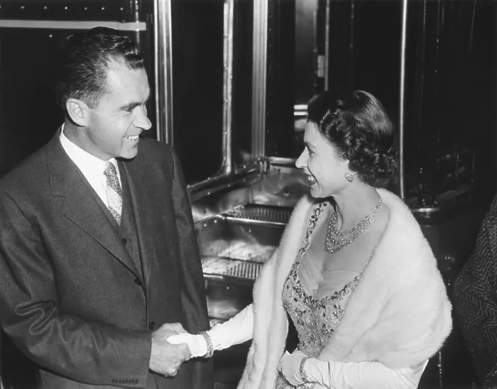Framed Print : Queen Elizabeth II shaking Vice President Richard Nixon's hand. At the British Embassy in Washington during a dinner the royal couple gave for President and Mrs. Eisenhower