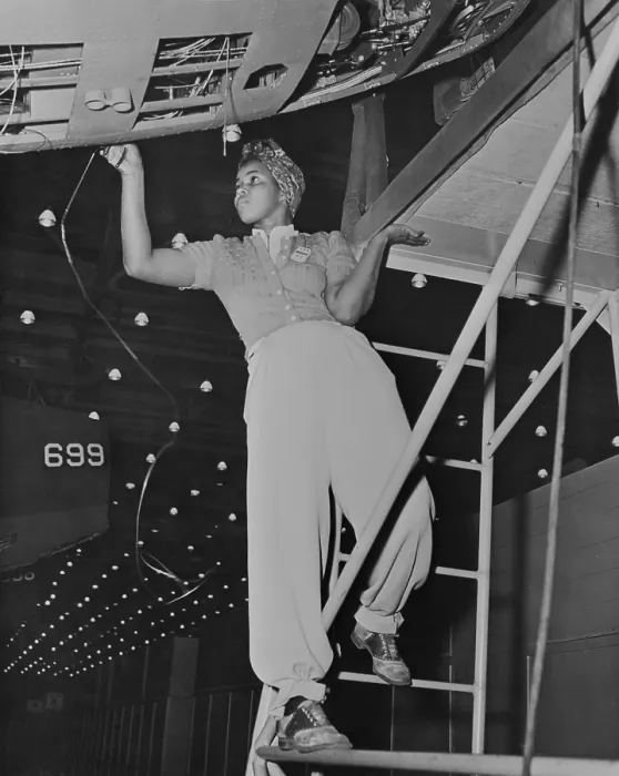 Framed Print : Racially integrated workers in a Douglas Aircraft Company during World War 2. In the Long Beach Plant men and women of fifty-eight national origins worked side by side. Ca
